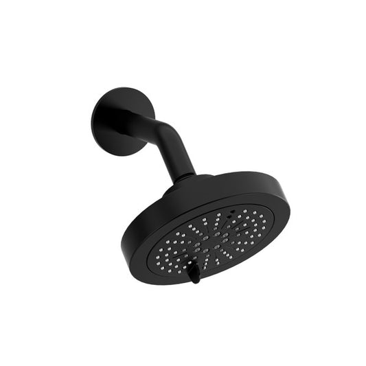 Black round showerhead mounted on a wall.