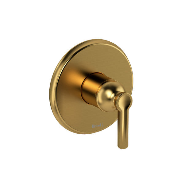 Modern gold faucet handle on a circular plate
